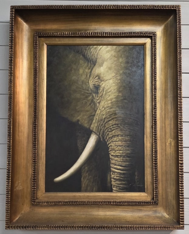 Artist Signed " The Elephant" Oil on Canvas: Large contemporary wildlife realism oil painting on canvas titled "The Elephant". Artist signed. Features an ornate wooden frame finished in a distressed metallic gold gilding. Some wear of finish on 