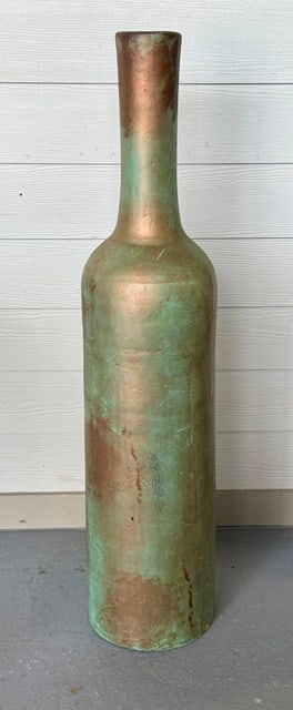 Two Toned Pottery Art Floor Vase: Two toned pottery art floor vase. It features a tall, slender silhouette styled similarly to an oversized wine bottle. Some chips present around base. Approximately 44"h x 10"w. Photos are considered 