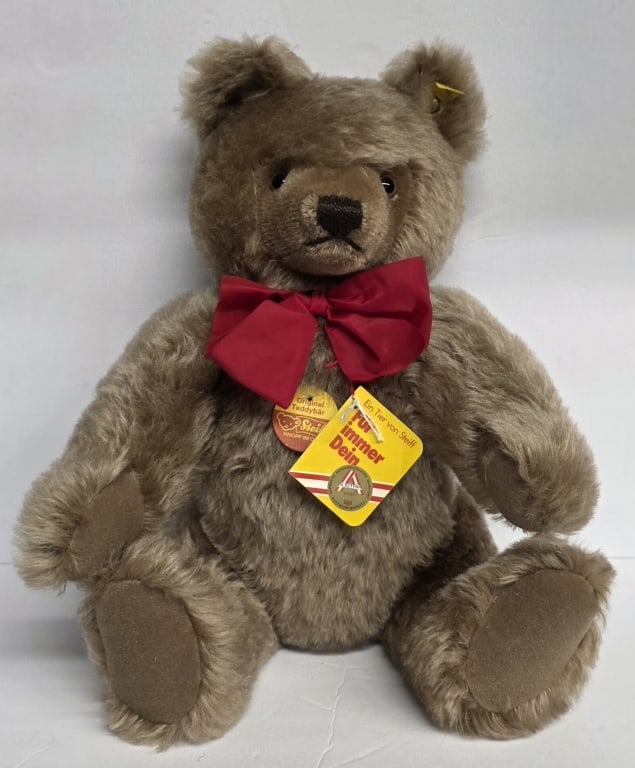 1980's Steiff Original "Mask" Teddy Bear: 1980s Steiff Original "Mask" Teddy Bear. Features brown mohair fur, felt pads, and a hand stitched nose. Five way jointed. Yellow tag on ear is marked 0202/041. Made in Austria. Approximately 15"h. Ph