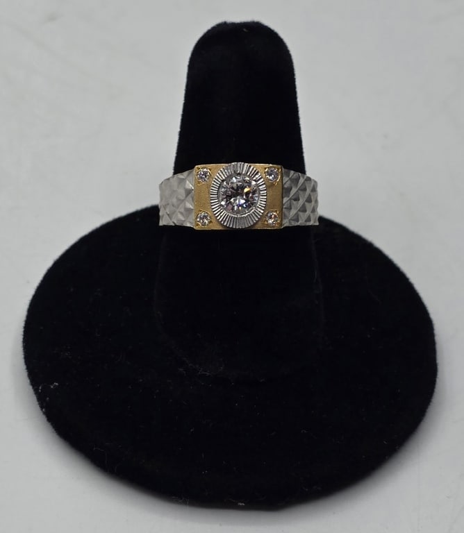 22k Two-tone Diamond Ring - 5.75g TW: 22k Two-tone diamond ring. Features a textured geometric pattern white gold shank and a yellow gold centerpiece set with a brilliant cut diamond surrounded by a white gold halo in the center as well a