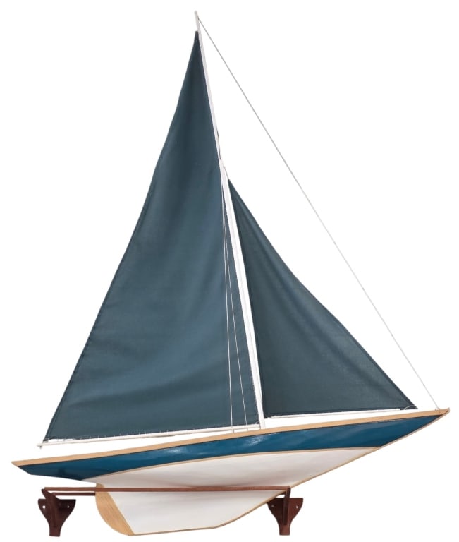 Handcrafted Decorative Model Sailboat: Handcrafted decorative model sailboat. Features teal sails and a teal painted wooden hull with a white underside. Includes wooden bracket. Approximately 67"h x 46"w. Photos are considered part of the 