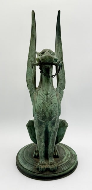 Neo-Grec Bronze Winged Gargoyle Statue: Neo- Grec bronze winged gargoyle statue. Believed to originally served as a decorative accent or base for lamp. Heavy patina present. Approximately 21.25"h x 9.25"rnd. Photos are considered part of