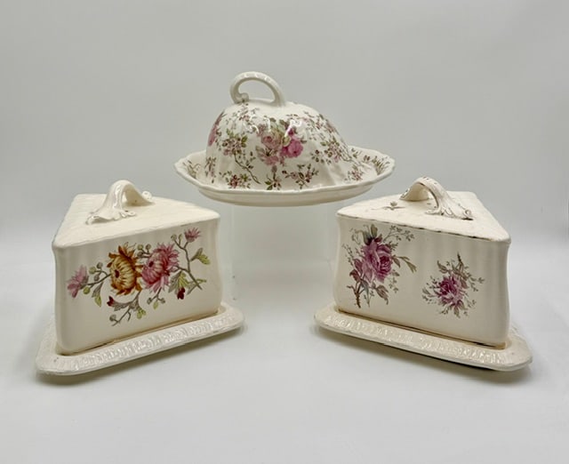 3pc Antique Ceramic Cheese Serving Dishes: 3pc Collection of antique ceramic cheese serving dishes. Pieces feature hand painted and hand transferred floral patterns. Set includes pair of 7" Royal Bonn wedge shaped dishes and 5.5" Empress Irons