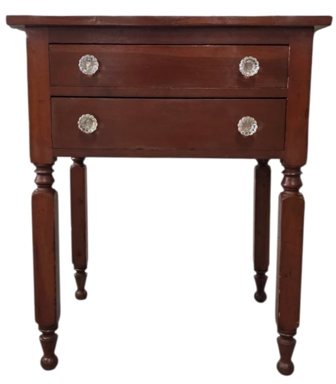 Vintage Sheraton Style 2 Drawer Nightstand: Vintage Sheraton style 2 drawer side table/nightstand. Table features elegant, ring turned legs tapering down toward the feet. Pressed clear knobs. In good condition for age. Approximately 29"h x 24"w