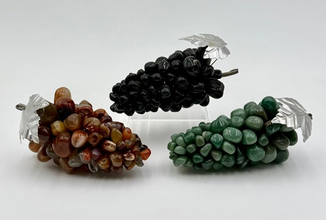 Vintage MCM Polished Stone Grape Clusters: Vintage mid-century modern decorative grape clusters crafted from polished semi precious gemstones. Each grape is a separate tumbled stone individually wired together onto a central stem, topped with