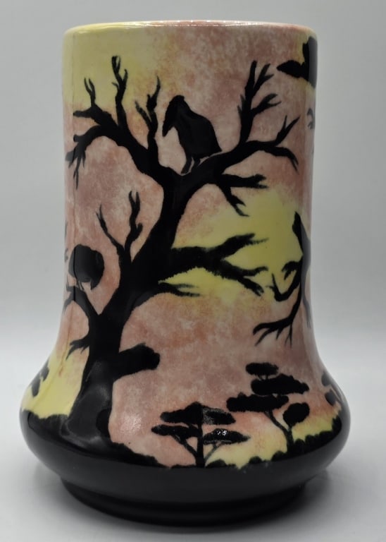 Anji Davenport "African Sunrise" Cobridge Vase: Vintage Cobridge Pottery "African Sunrise" stoneware vase. Designed by Anji Davenport. Vase features a hand painted African landscape scene with a vibrant pink, yellow, and orange sky, set against dar