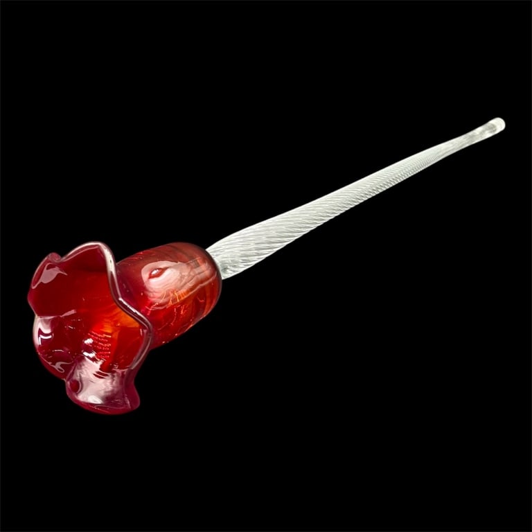 Beautiful Hand Blown Long Stem Art Glass Flower: Beautiful hand blown long stem art glass flower. Features a striking red bulbous blossom and a clear, ribbed twist stem. In excellent condition with no chips or cracks. Approximately 17.25" long. Phot
