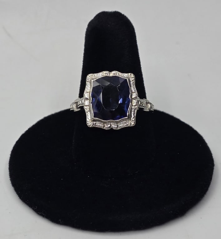 Antique 14k Sapphire Ring - 4.43g TW: Antique 14k sapphire(?) ring. Large cushion cut blue stone, believed to be sapphire, set in an art deco 14k white gold setting. 4.43g TW. Size 8. Photos are considered part of the description and