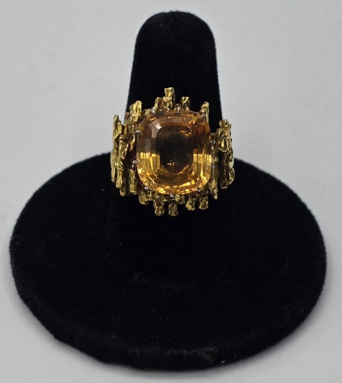 Beautiful 18k Citrine? Cocktail Ring - 12.94g: Beautiful 18k citrine? women's cocktail ring. Features a large, cushion cut citrine? gemstone set within a heavy, textured, and abstract molten/cast gold mounting. High profile basket setting. Approxi
