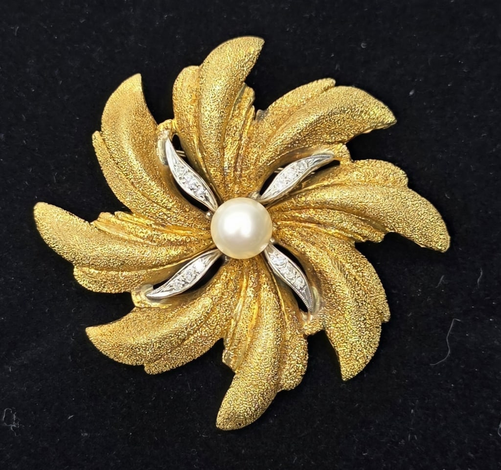 Vintage 18k Diamond & Pearl Brooch-28.67g TW: Vintage 18k starburst brooch/pendant. 28.67g TW. 14k Yellow gold brooch/pendant with sweeping petals featuring a sandblasted finish. Single white pearl in the center with 4 white gold tendrils branchi