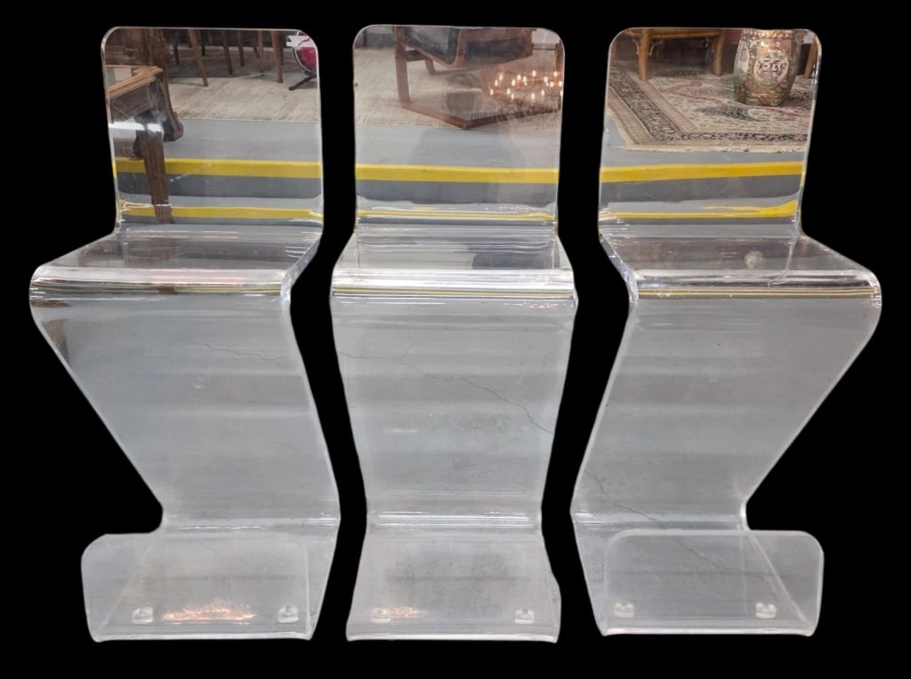 Set of 3 MCM Lucite 'Z' Stools: Set of 3 MCM lucite 'Z' stools. Stools feature a distinctive cantilevered, sculptural silhouette. Some scuffs present. Approximately 42.5"h x 16"w x 17"d. Photos are considered part of the condition