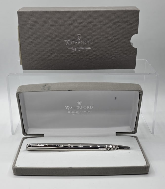 Waterford Lismore Silver Plated Ballpoint Pen: Waterford Lismore silver plated ballpoint pen. Luxury writing instrument features a high polish silver finish decorated with a distinctive diamond cut criss-cross texture near the grip zone. Includes 