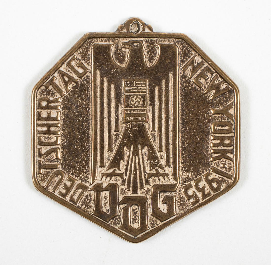 WWII 1935 GERMAN-AMERICAN BUND FOB: German WWII bronze fob, reading 'DEUTSCHER TAG NEW YORK 1935 VDG' (German Day New York 1935 VDG), sold by the pro-Nazi German-American Bund, a hectagonal one-sided fob or medal 1.25 in. (34mm) wide, a