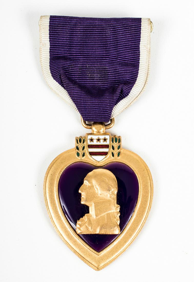 WWII U.S. NAMED PURPLE HEART: WWII named U.S. Army Purple Heart with ribbon, identified to Arthur Wellesley Hackwood, Infantry Company Commander, Italy. Privately machine engraved with service number '560-10-7948'. Slot brooch.