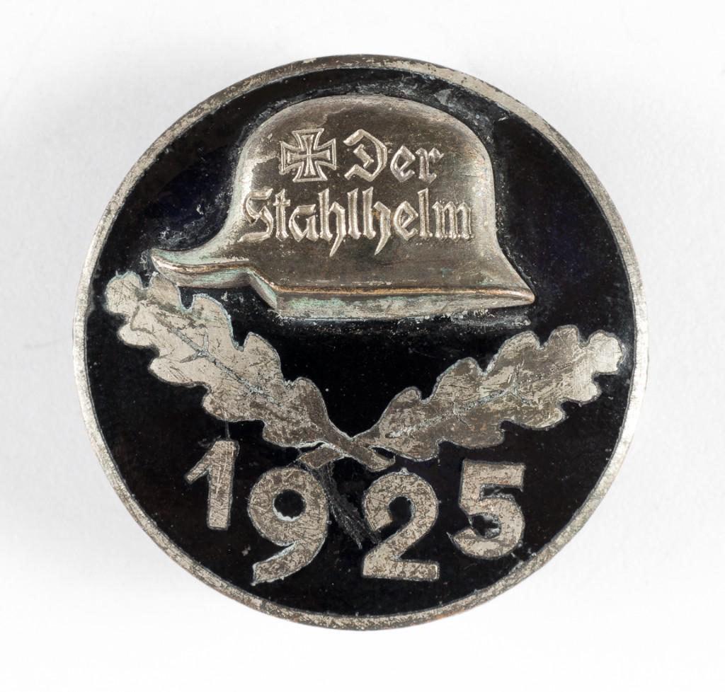 DER STAHLHELM 1925 BADGE: DER STAHLHELM 1925 BADGE German Der Stahlhelm Bund der Frontsoldaten badge for 1925, riveted helmet with Iron Cross. Maker marked 'STh' standing for the Stahlhof Magdeburg, and patent mark 'Ges.Gesch.