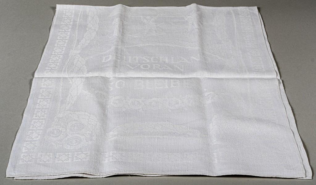 ZEPPELIN TABLE CLOTH: ZEPPELIN TABLE CLOTHAntique Zeppelin table linen, images woven in the fabric on both sides. A Zeppelin in flight above a village and on the opposite side three farmers waving at the Zeppelin and readi