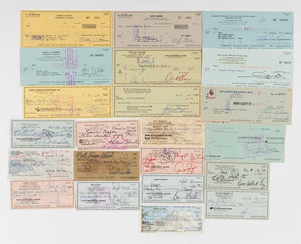 AMERICAN SHOWBIZ SIGNED CHECKS (22): AMERICAN SHOWBIZ SIGNED CHECKS (22) Lot of 22 signed checks from American entertainers, singers, actors, includes Charles Bronson, Glenn Ford, Atlanta Braves Inc., Goldie Hawn, Fern Formica, Bobby She