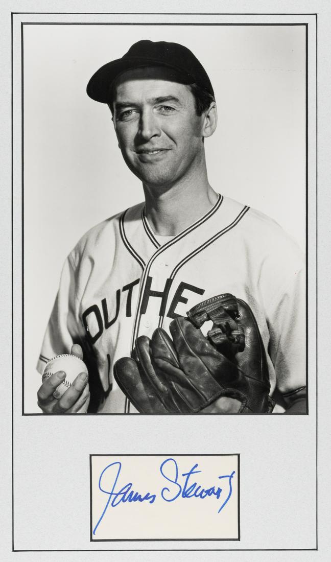 JAMES STEWART: JAMES STEWART(1908 - 1997) American actor. James Stewart signed index card in blue ink, matted with a b/w photograph from the 1949 movie 'The Stratton Story', 11 x 16.55 inches overall.