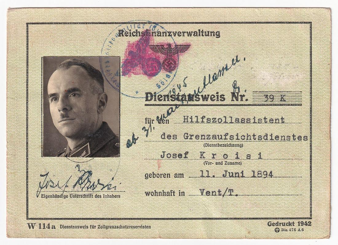 NAZI BORDER GUARD IDENTIFICATION CARD: German Dienstausweis or Service Identification card issued by the Reichs Finance Administration to Josef Kroisi, born 11. June 1894, deputy assistant to the border patrol supervisory service, the ID b