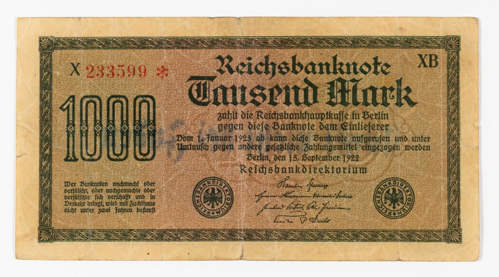 ANTISEMITIC 1000 REICHS MARK BANKNOTE: German overprinted 1000 Reichs Mark banknote printed in 1922, the reverse has been overprinted in German 'DON'T BUY FROM JEWS!' (Kauft nicht bei Juden!). 6.25 x 3.25 inches.