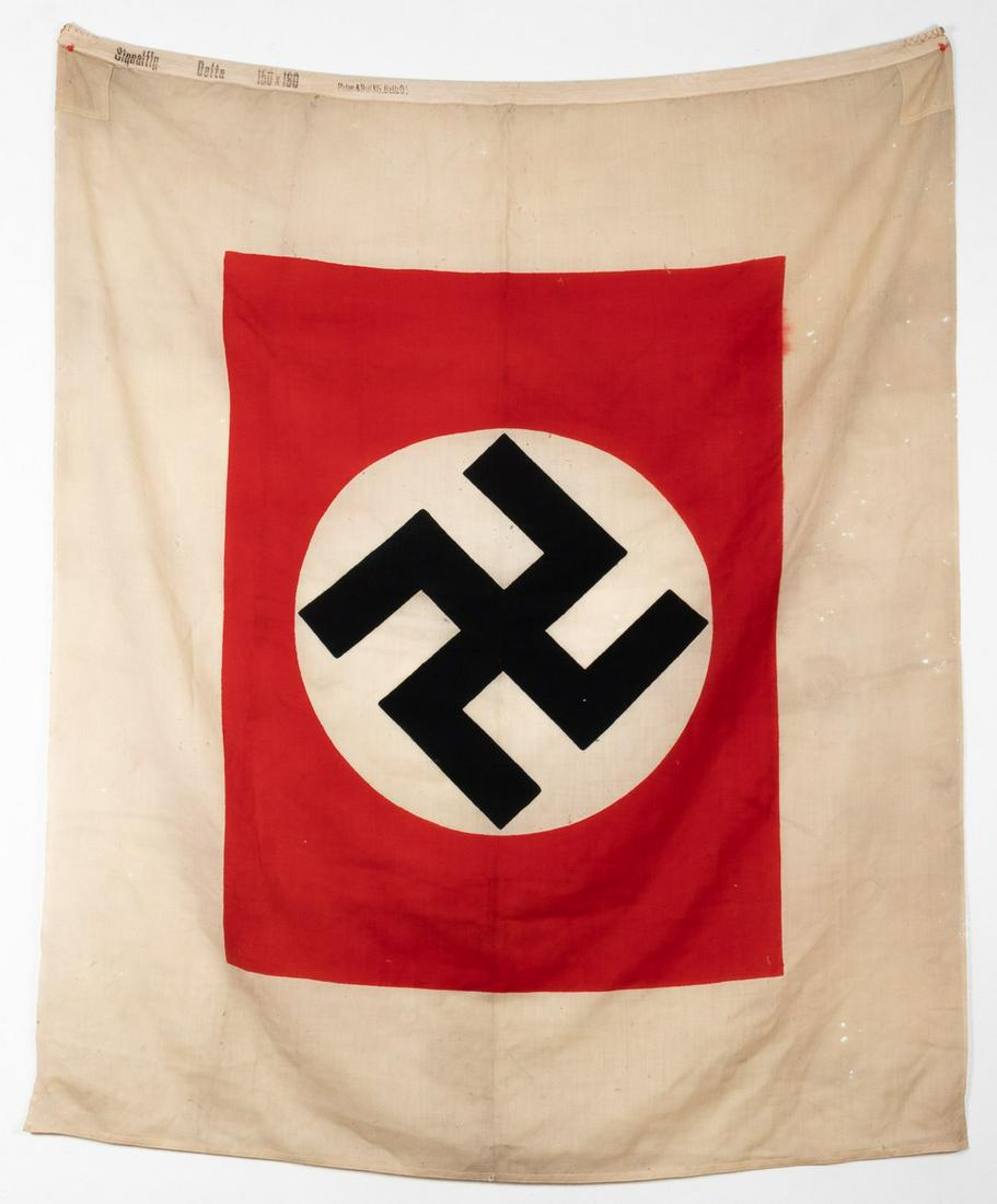 LARGE GERMAN WWII NAVAL SIGNAL FLAG: Large German WWII signal flag, printed on the hoist 'Signalflg. Delta 150 x 180 Plutzar & Brull KG Bielietz OS'. The hemp rope has been cut off. Despite the overall mothing this is a very good example