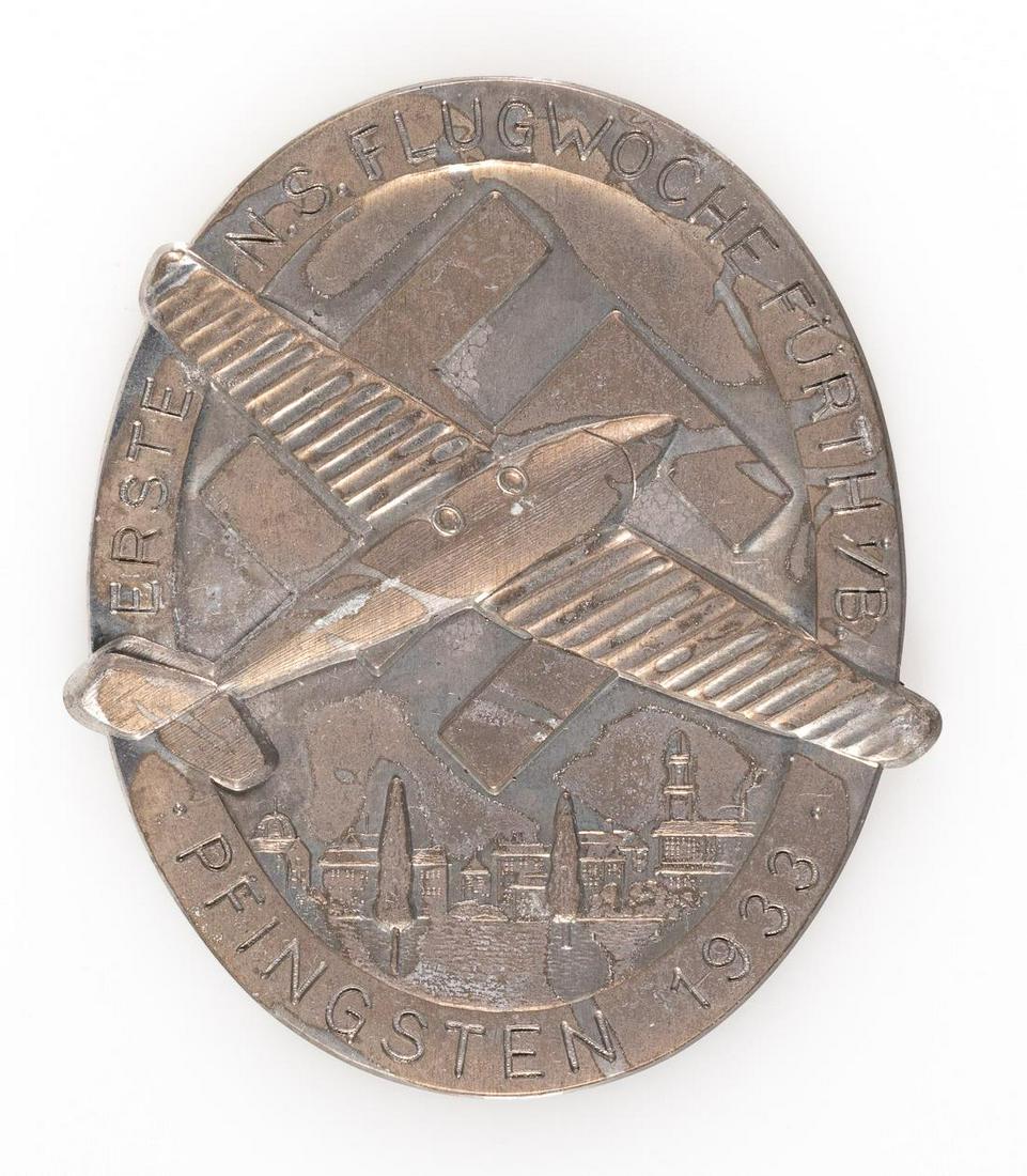 1933 GERMAN NSFK GILDER KORPS MEDAL: 1933 NSFK glider Flieger Korps medal, The obverse shows a glider plane in the center on top of a mobile swastika, inscribed around the edge 'First N.S. Flight Week Furth in Bavaria Pentecost 1933' (Er
