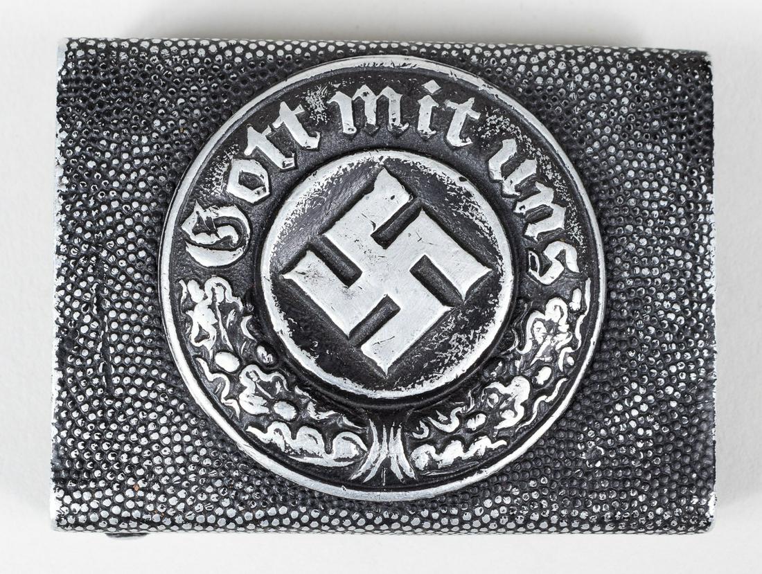 WWII GERMAN POLICE BELT BUCKLE: German WWII Police belt buckle, two parts construction, aluminum, 'Gott mit uns' (God with us) and rotated swastika. Age related wear and dents.