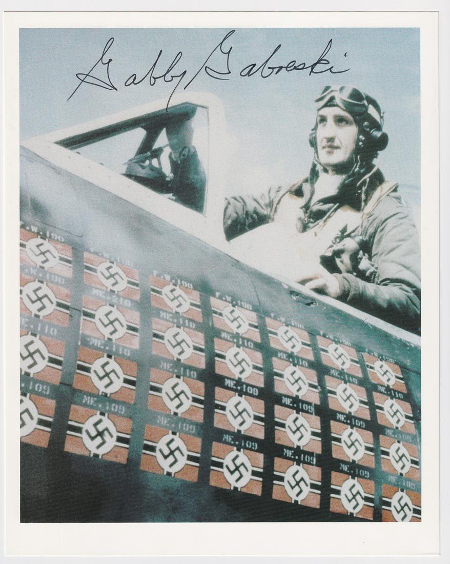FRANCIS GABBY GABRESKI: (1919-2002) Top American fighter ace (34 1/2 kills) over Europe during World War II and a jet fighter ace with the Air Force in the Korean War. Signed photograph of Gabreski in the cockpit of his P-47