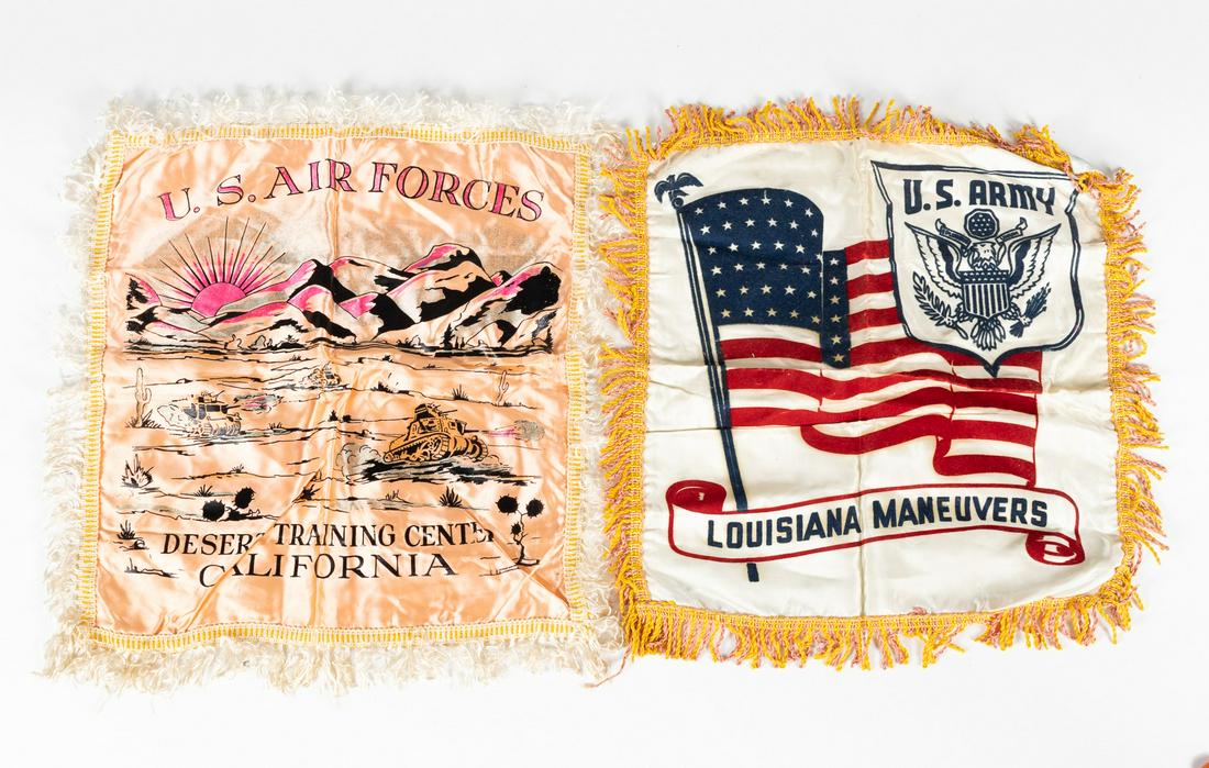 WWII MILITARY PILLOW SHAMS (2): Pair of WWII souvenir pillow shams, including a 'U.S. Air Forces Desert Training Center California' pillow sham and a 'Louisiana Maneuvers' pillow sham. Shams are made of satin fabric, crushed velvet,