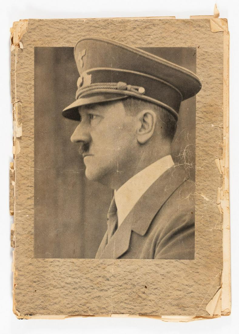 HITLER BIRTHDAY PHOTOBOOK: Illustrated magazine propaganda made for Adolf Hitler's 50th birthday, Franz Eher Nacht, Munich, 1939. 14 x 10 inches. Numerous photos of Hitler, many taken by Heinrich Hoffmann. Book has damage and v
