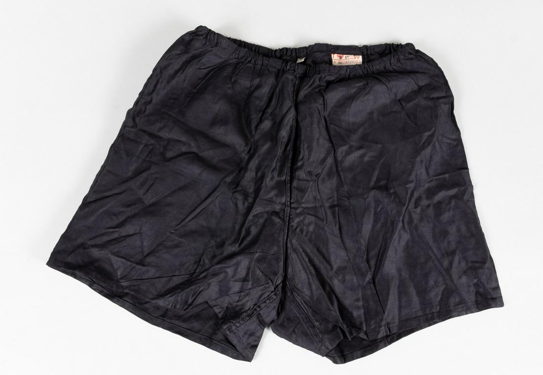 HITLER YOUTH SPORT SHORTS: Hitler Youth black athletic shorts. Elastic waistband and single back pocket. Waistband bears a RZM label.