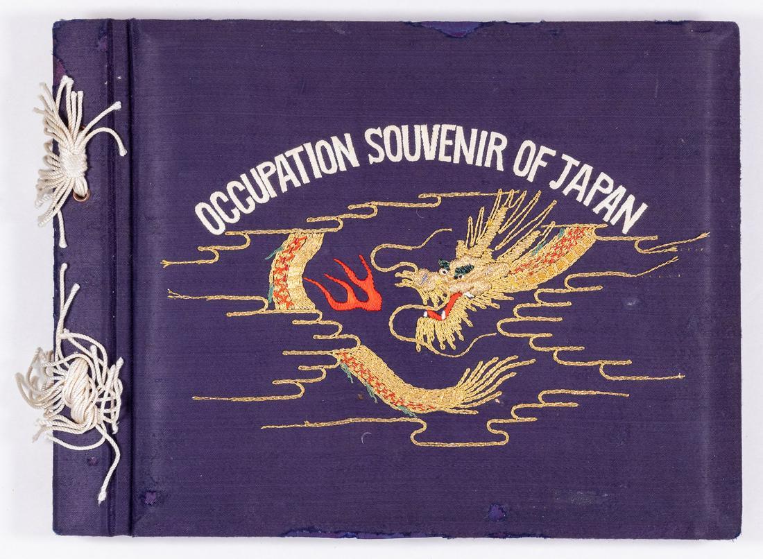 OCCUPATION SOUVENIR OF JAPAN PHOTO ALBUM: Photo album belonging to Private First Class Cosmo F. Aurigemma, who served in the occupation of Japan and Korea from 1948 to 1950. The photos show soldiers socializing, boxing, Japanese people, famil