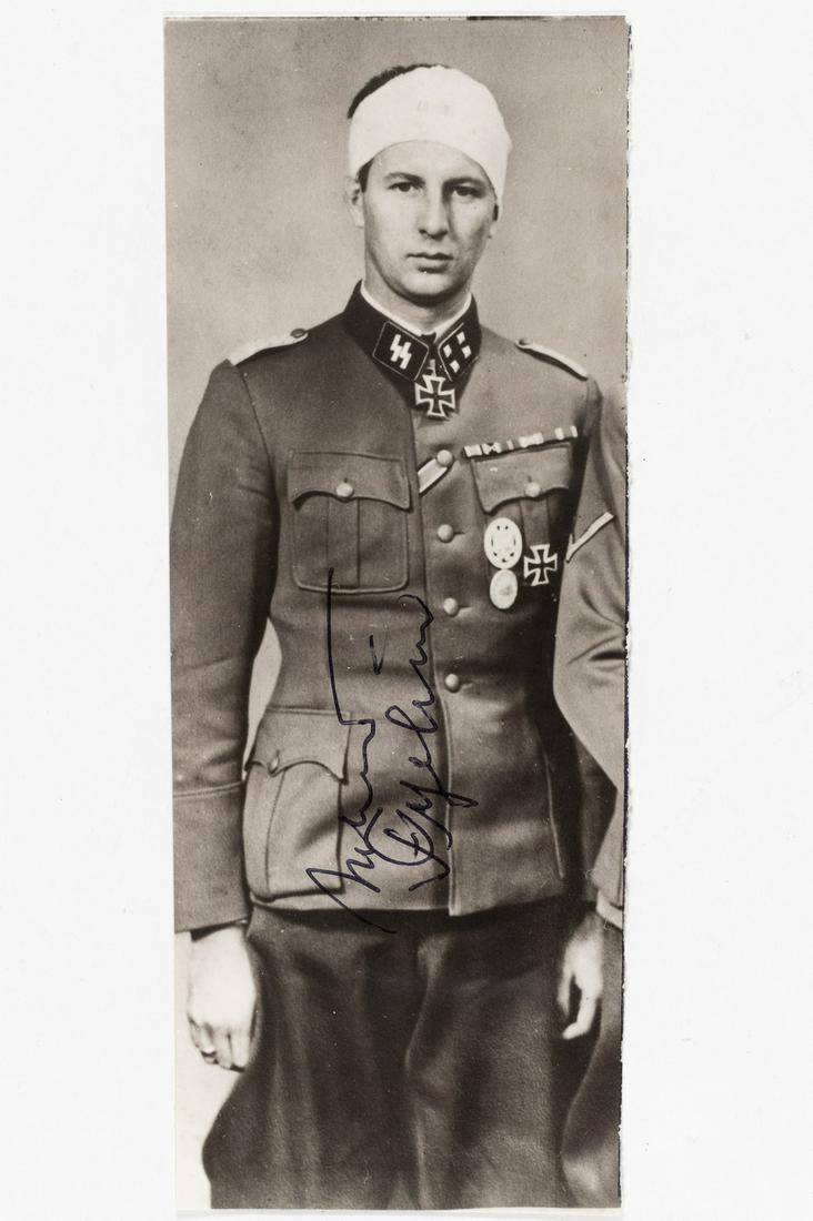 WALDEMAR FEGELEIN: (1912-2000) was a SS-Standartenfuhrer in the Waffen-SS during WWII. Waldemar is the younger brother of Hermann Fegelein, brother-in-law to Eva Braun. Signed in black ink on obverse. 5.5 x 2.25 inches.