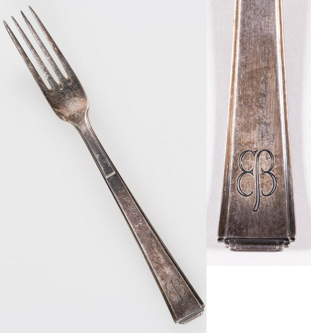 EVA BRAUN PERSONAL SILVERWARE FORK: A fork from a personal silverware set that once belonged to Eva Braun, Adolf Hitler's mistress and wife for a very short time. The silver-plated fork is engraved with the stylized butterfly monogram '