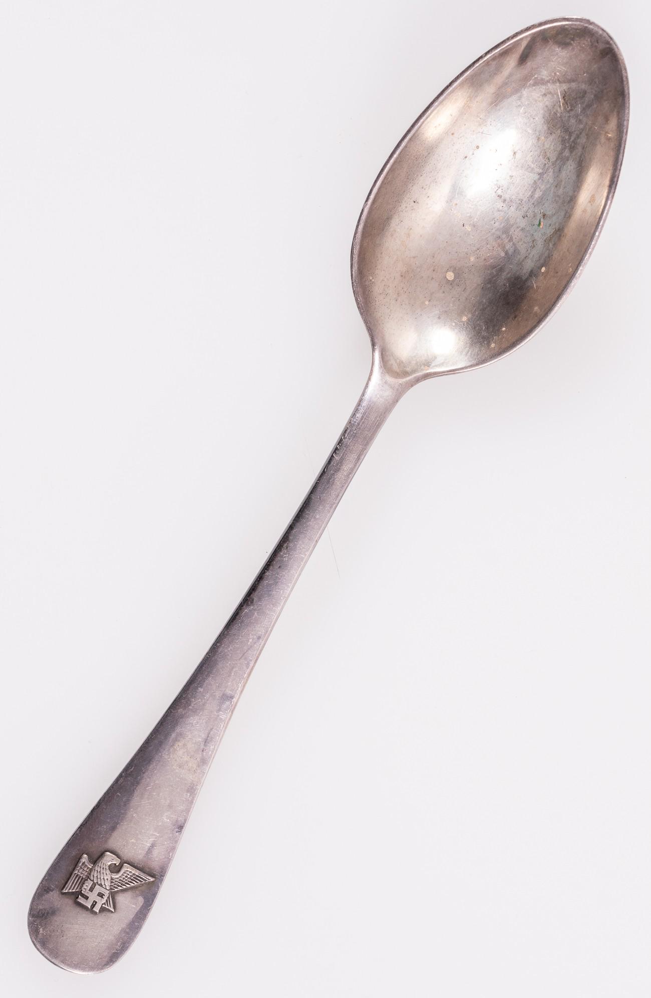 FRITZ SAUCKEL SPOON FROM HIS PERSONAL SILVERWARE: Silver-plated soup spoon from the personal silverware set belonging to Fritz Sauckel, Gauleiter of Thuringia. The spoon bears the raised eagle insignia of the Gauleiter of Thuringia on the handle. Sil
