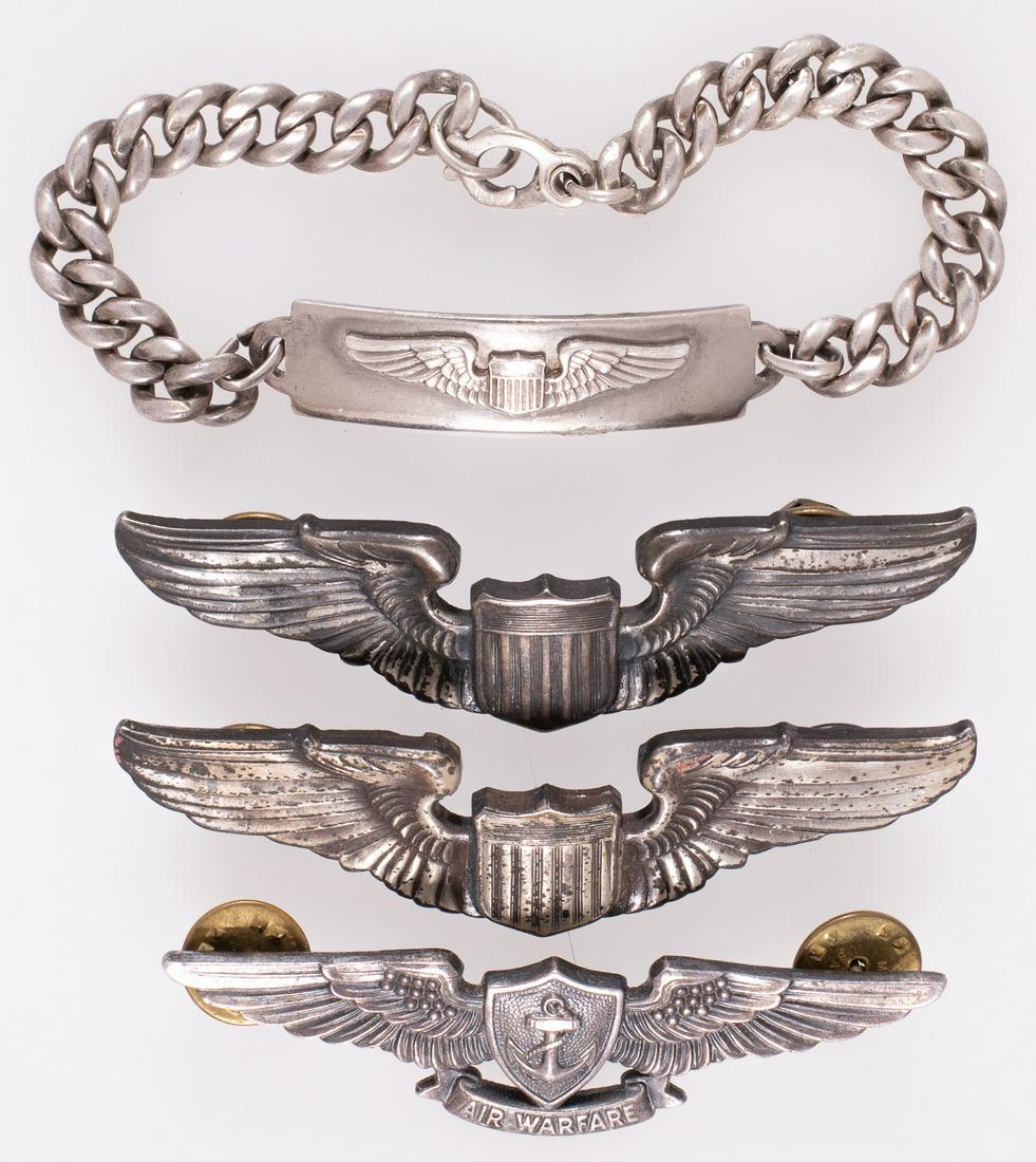 U.S. PILOT WINGS: Lot of three US airforce pilot wings and one bracelet, includes one Enlisted Aviation Warfare Specialist bdge from 1980; two USAF Pilot wings from 1949; and one sterling silver US Air Corps ID bracele