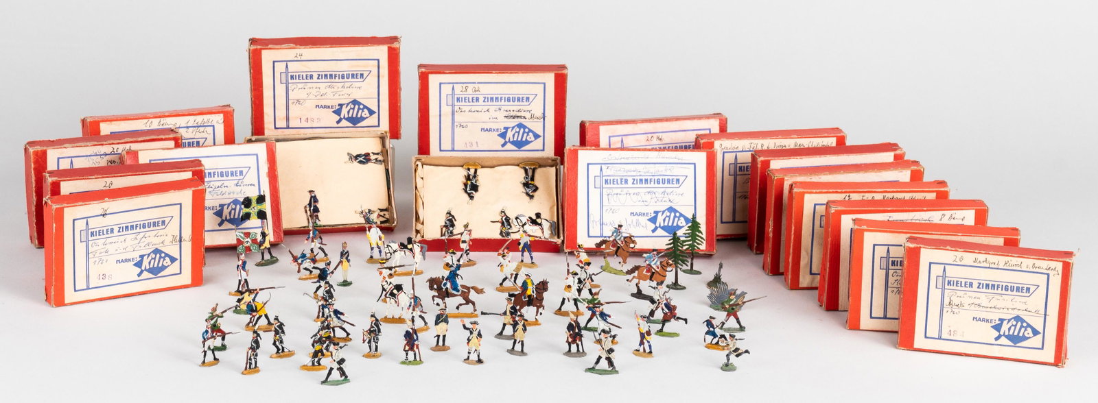 EARLY GERMAN FLAT TIN SOLDIERS: Large lot of sixteen boxes of early German flat tin (pewter) soldiers 'Kieler Zinnfiguren KILIA'. Approx. 300 pieces.