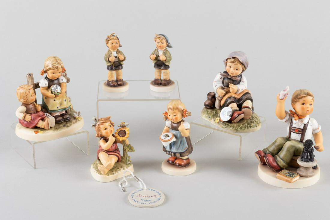 7 GOEBEL HUMMEL FIGURES: Lot of seven Goebel Hummel figurines, including 'The Final Sculpt', 'Butterfly Wishes', 'Let Me Help You', 'Bee Hopeful', 'Two Little Luck Figurine', and 'Sunflower Friends'. All figurines come with o