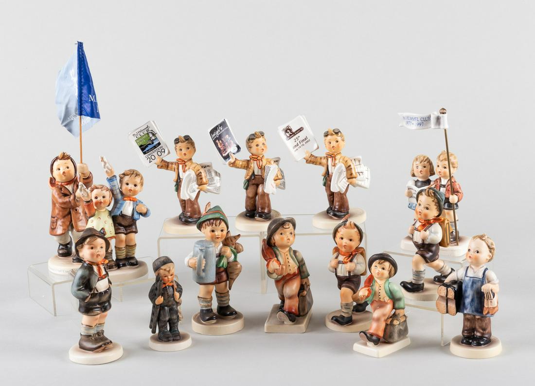 14 GOEBEL HUMMEL FIGURINES: Grouping of fourteen Goebel Hummel figurines, including schoolboys, boots, and others.