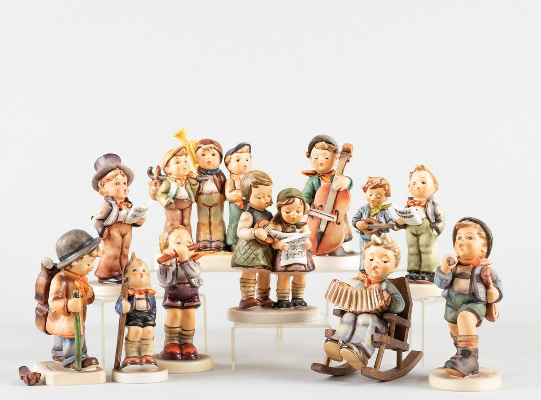 11 GOEBEL HUMMEL FIGURINES: Lot of eleven Goebel Hummel figurines, including 'Soloist', 'Morning Concert', and 'Little Cellist'. Two Hummels are chipped, else good.