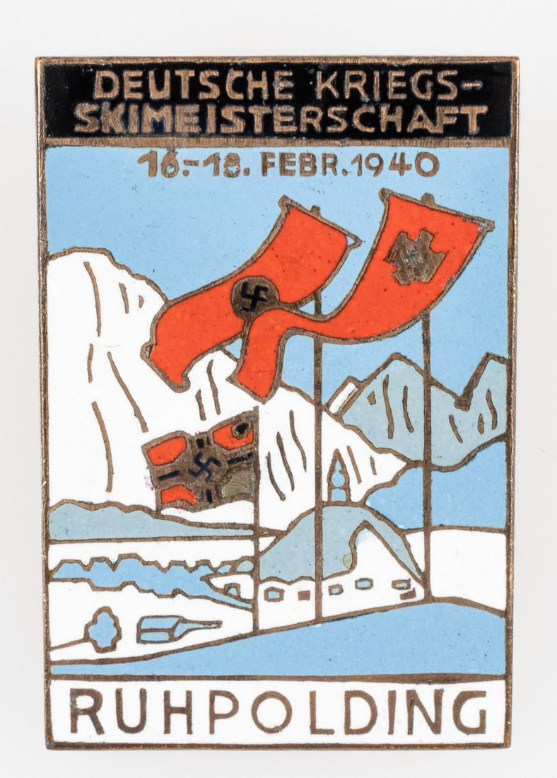 THIRD REICH SKI CHAMPIONSHIP BADGE: German WWII pin for the 'German War Ski Championship' ('Deutsche Kriegs-Skimeisterschaft') held in Ruhpolding on 16.-18. February 1940. The enamel pin shows three Nazi flags blowing in the wind on a s