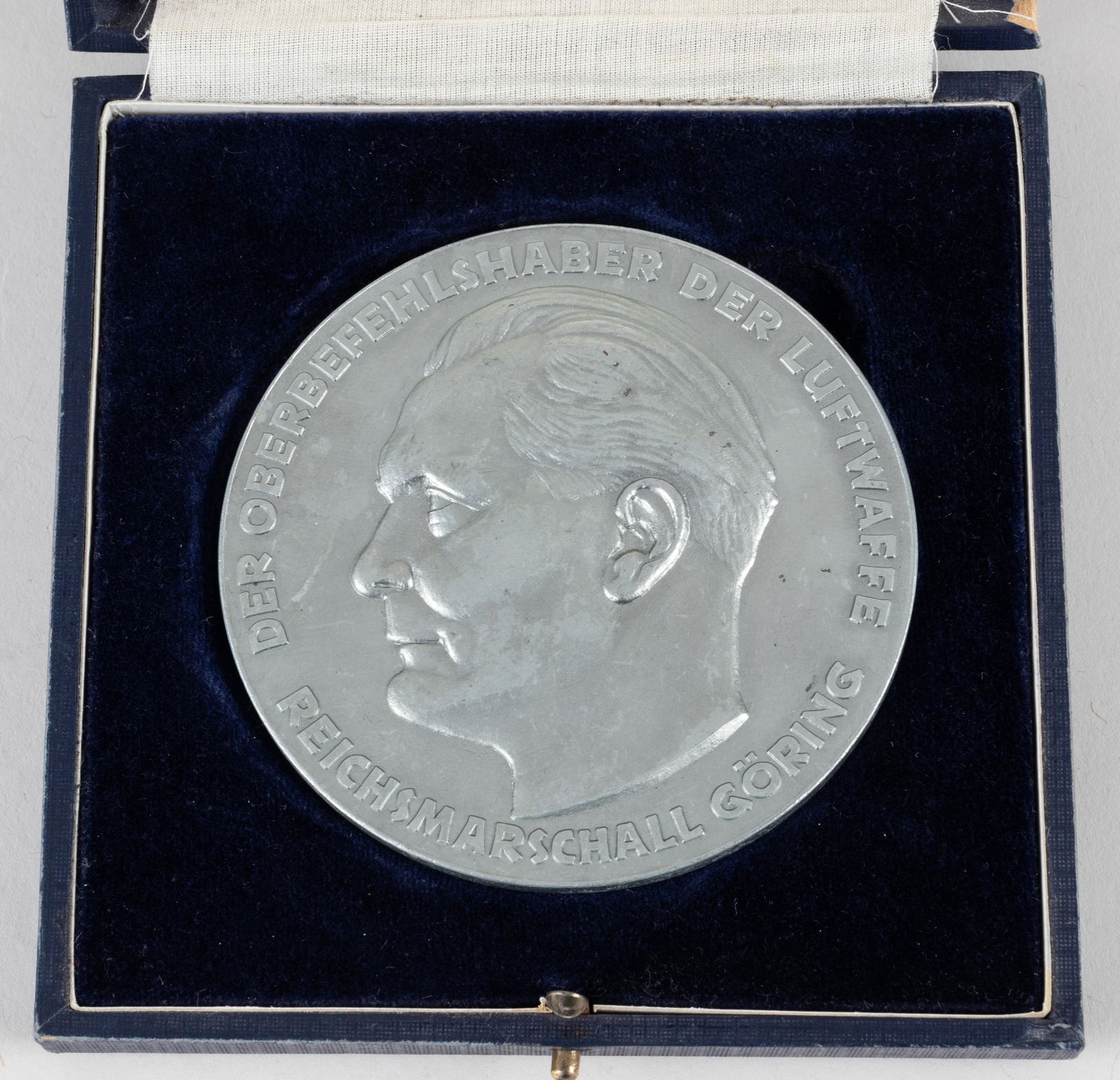CASED HERMANN GORING LUFTWAFFE TABLE MEDAL: German WWII award for a member of the Luftwaffe, a table medal bearing the profile of Hermann Goring on the obverse, marked 'Der Oberbefehlshaber der Luftwaffe Reichsmarschall Goering' (The Supreme Co