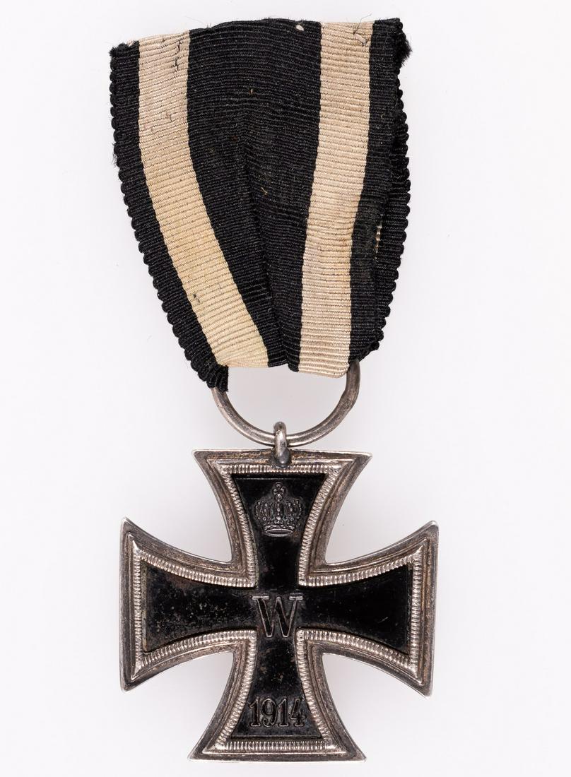 WWI IRON CROSS 2ND CLASS PRINZEN SIZE: Prinzen sized 1914 German World War I Iron Cross Second Class, 33.5 mm x 33.5 mm, with ring marked 'KO' and ribbon, approx. 30 mm wide and stitched together at the top end. Magnetic iron core. No visi
