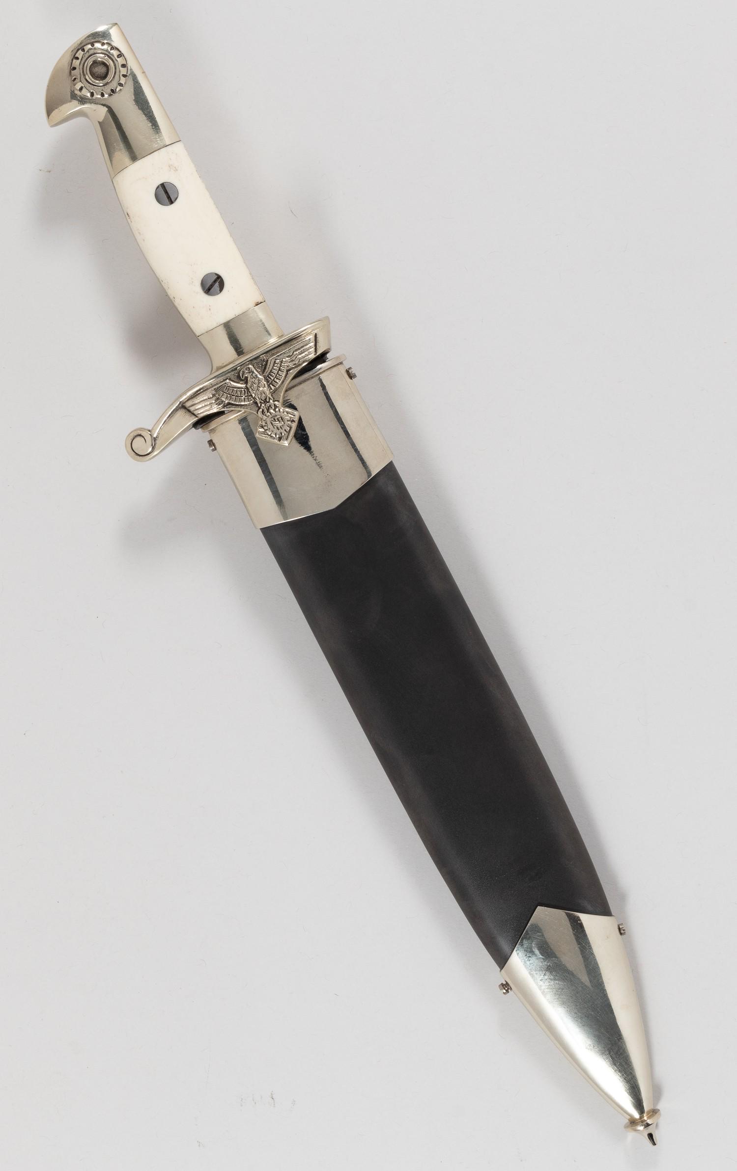 GERMAN TENO DAGGER: German WWII Teno dagger Eickhorn Solingen postwar production. Chrome plated grip with Nazi eagle on the crossguard and ivory colored grips. The blade is marked Eickhorn Solingen with the TENO insignia