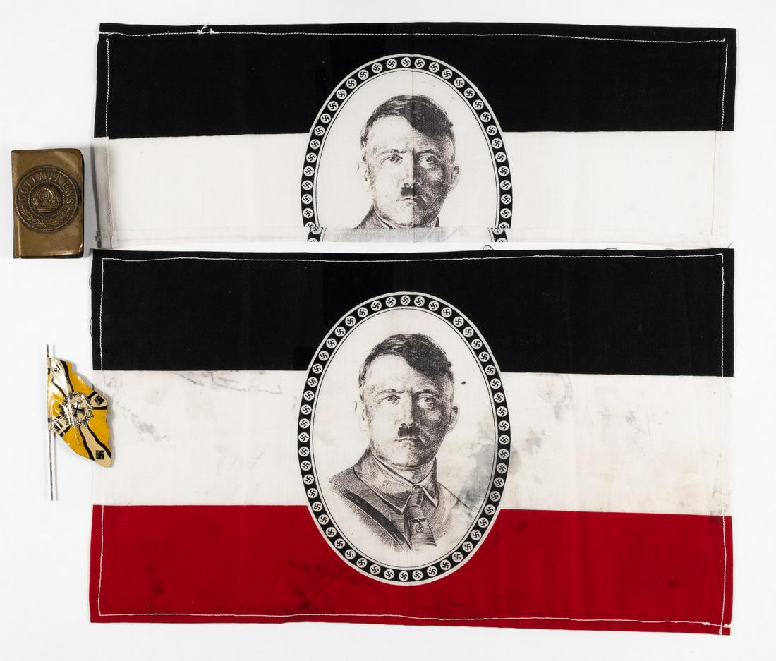 4 NAZI INSIGNIAS: Lot of four Nazi insignias including two Hitler German flags, a matchbook cover, and a small metal Luftwaffe flag. The German flags feature a printed illustration of Hitler at the center, surrounded b