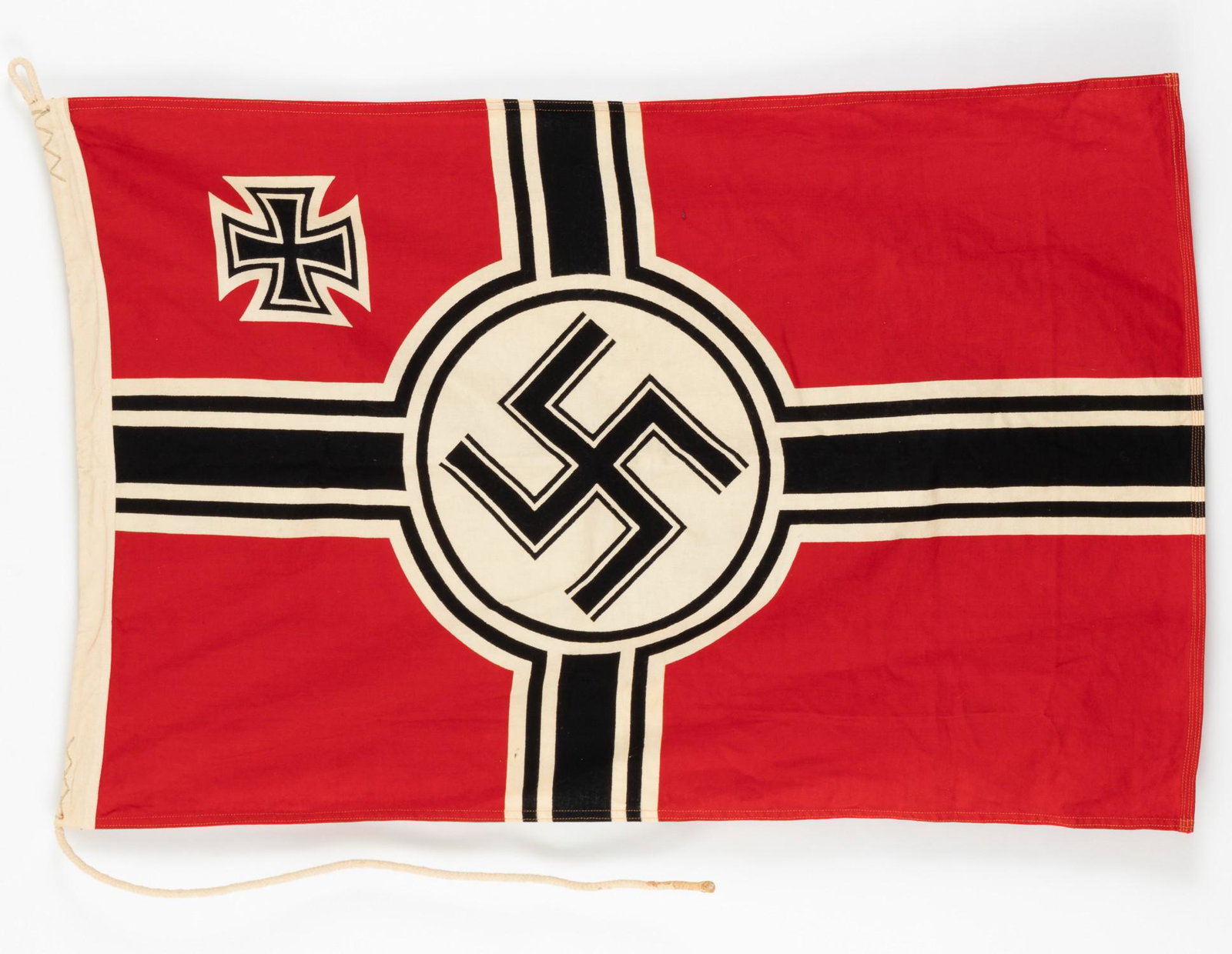 WWII GERMAN NAZI BATTLE FLAG: WWII German Reichskriegsflagge / national war ensign, flag with red field with a white-black-white bordered black cross with a larger center disk and a white-black bordered swastika instead of an eagl