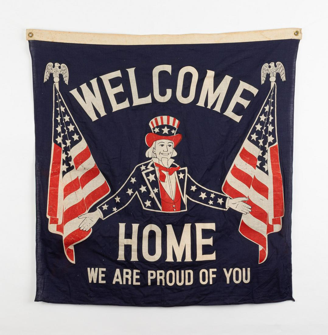 WWII SOLDIER WELCOME HOME BANNER: WWII banner displaying Uncle Sam on a blue background with outstretched arms, with bold exclamation 'Welcome Home - We are Proud of You'. White cloth reinforcement, two grommets, 34.75 x 35.75 inches.