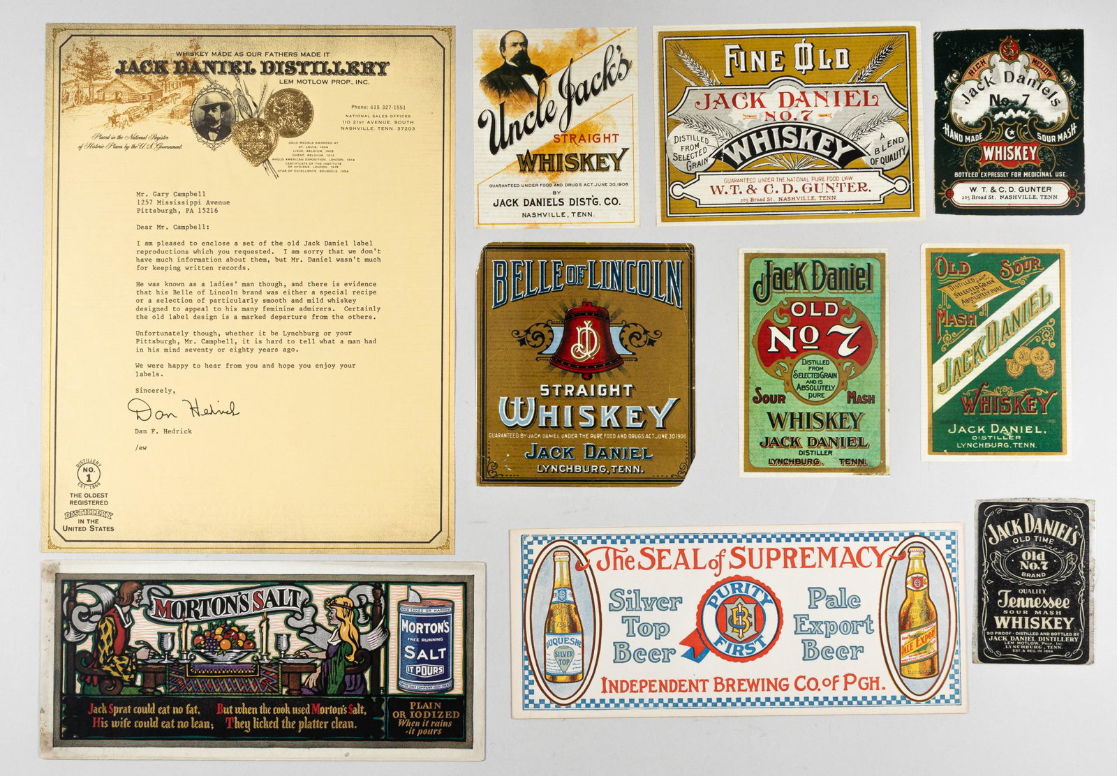 VINTAGE JACK DANIELS WHISKEY LABELS: Lot of seven reproductions of vintage Jack Daniel labels, reprinted in the 1970s, approx. 4 x 3.5 inches, with letter from the Jack Daniel's Distillery, 10.75 x 8.5 inches. WITH: Two vintage advertise