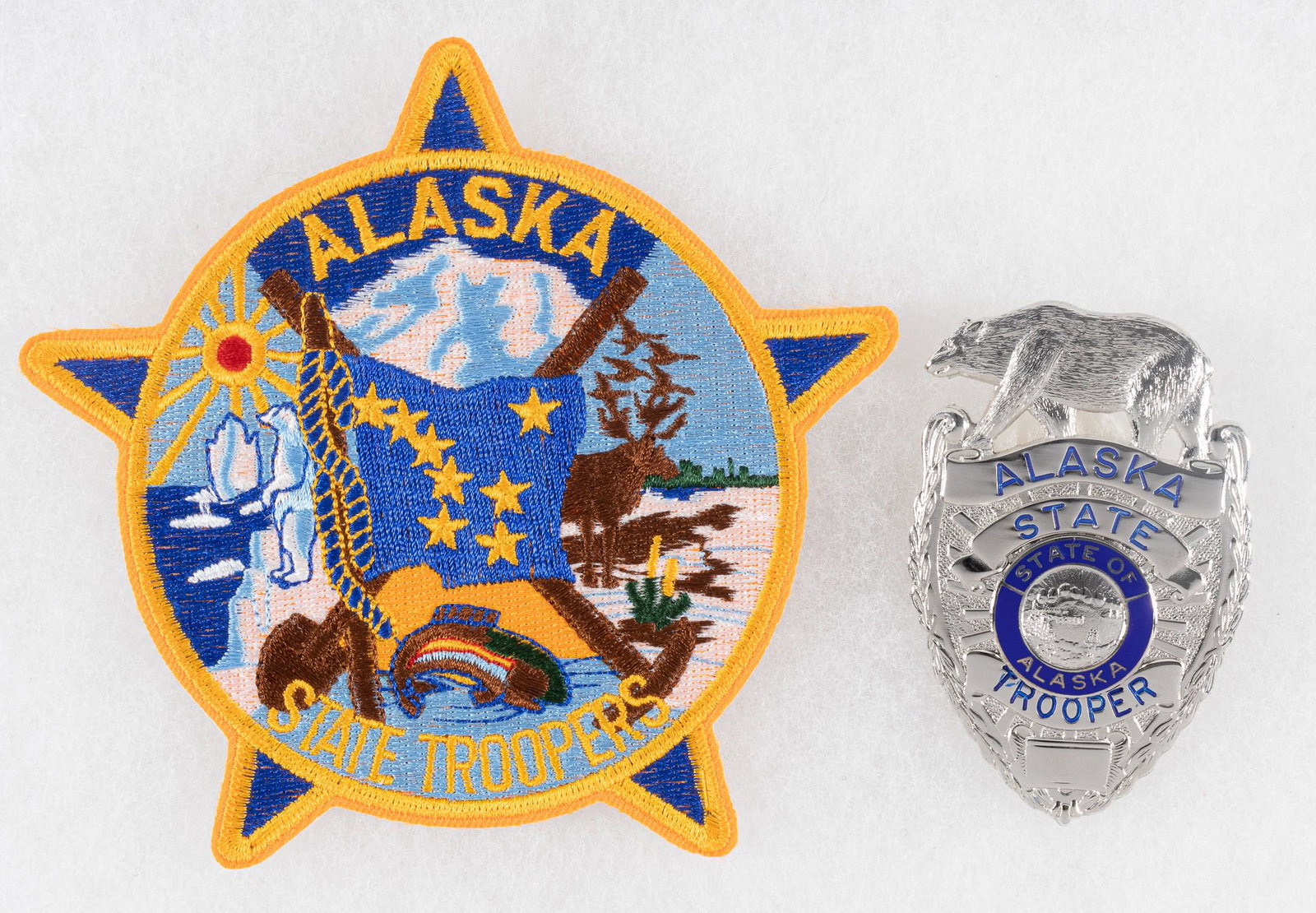 ALASKA STATE TROOPER BADGES: Badge for the Alaska State Troopers, pinback, unmarked. Includes patch for the Alaska State Troopers.