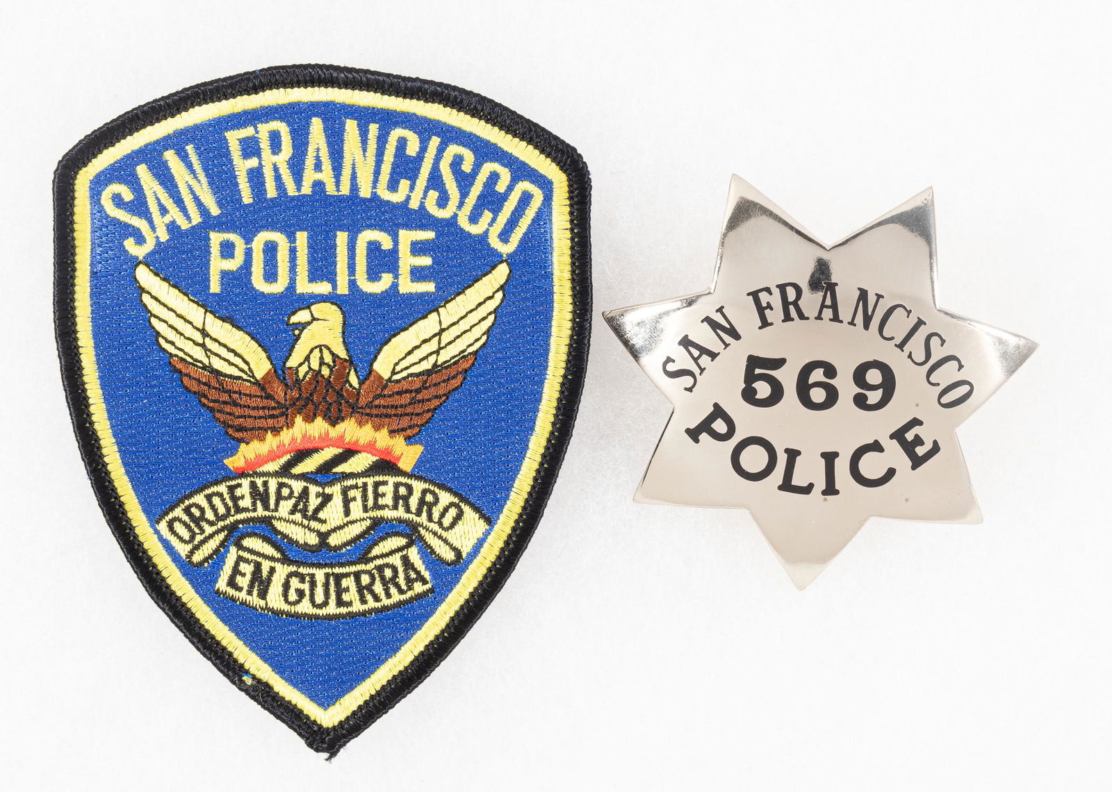CALIFORNIA SAN FRANCISCO POLICE BADGES: Badge for San Francisco Police, pinback, unmarked, numbered on obverse '569'. Includes patch for San Francisco Police.